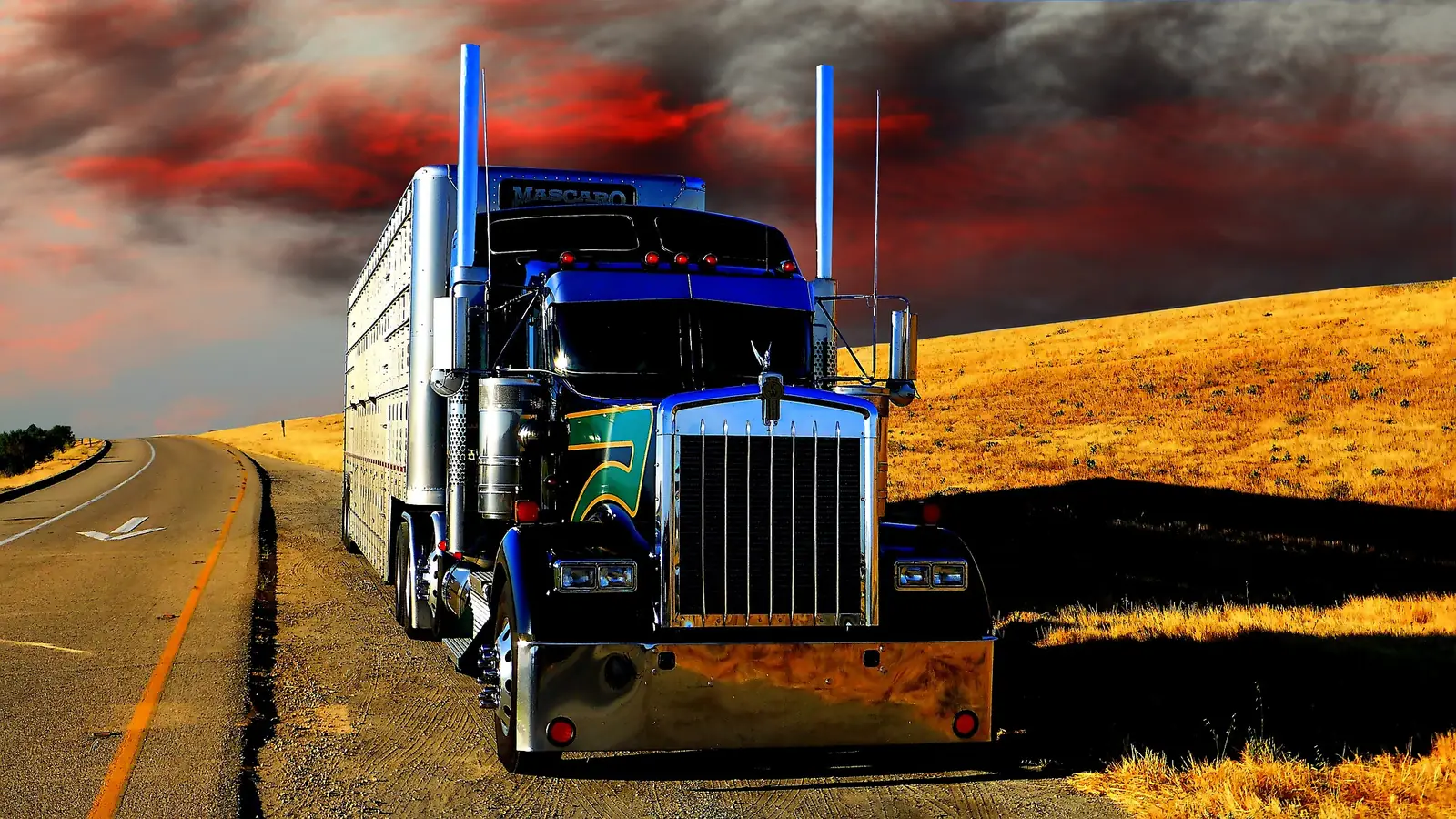 Trusted by Oklahoma owner-operators and independent truckers Classic blue Kenworth W900 long-hood tractor on the open road — Bledsoe Truck & Trailer Repair has earned the trust of independent owner-operators across Oklahoma.